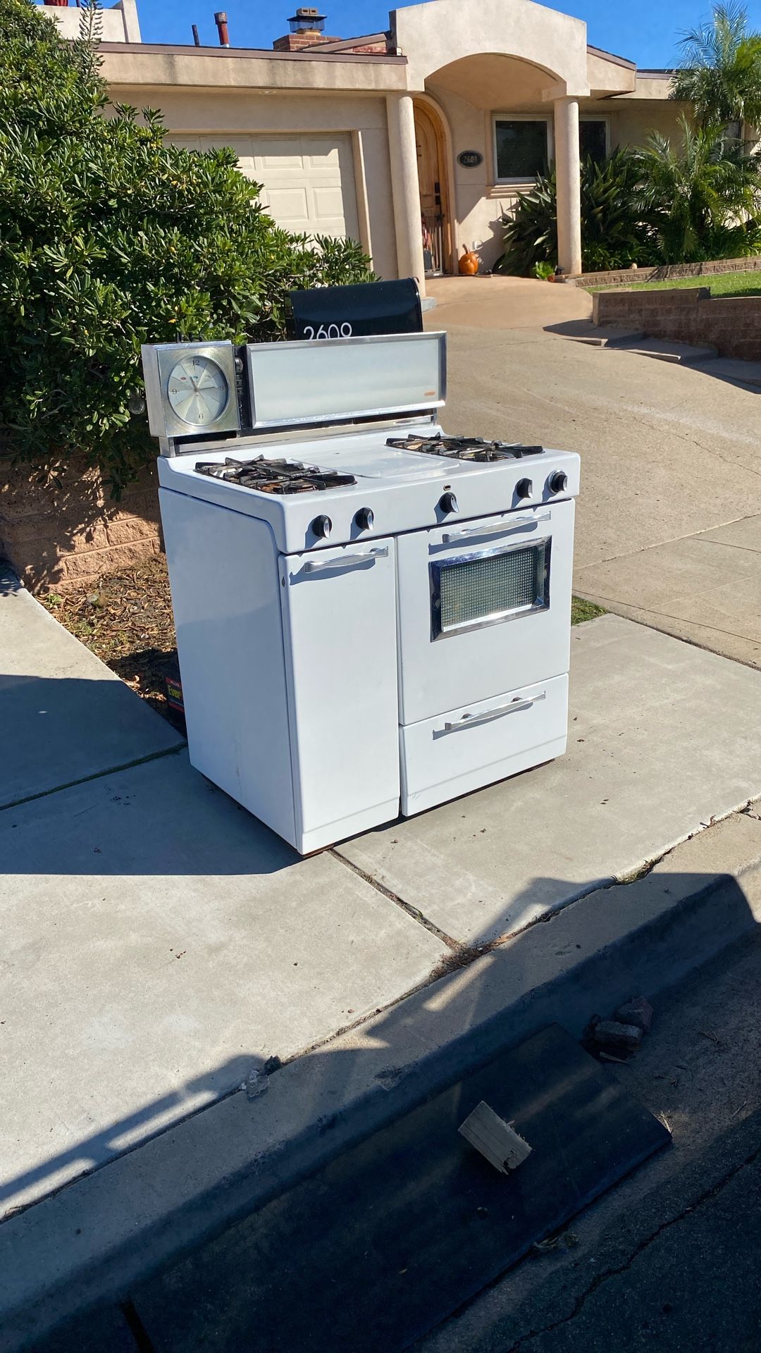 Antique Gas stove 36 inches wide with griddle working free