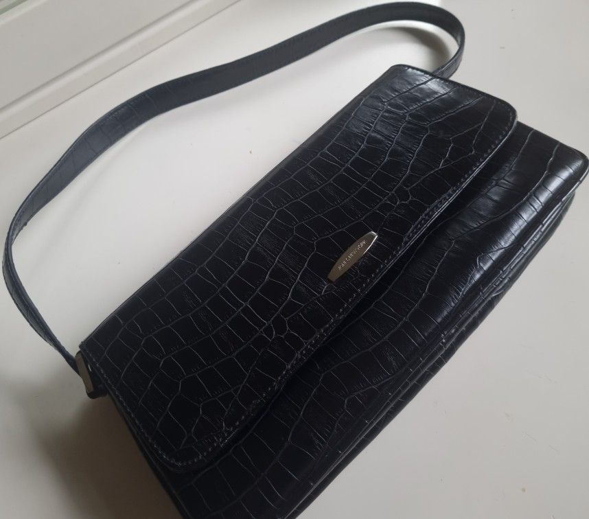 Jones New York black  handbag with a crocodile-embossed texture. 