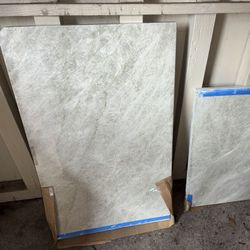 Perla Venata Quartzite slabs. 