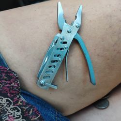 Many Tool Multi Tool In Like New Condition With Plyers On The End 