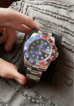 Blue and red men’s watch