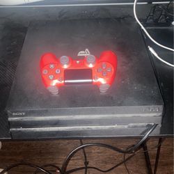 PS4 Pro (comes with games controller)