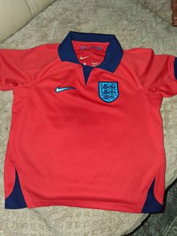 Nike youth red England 3 Lions jersey.