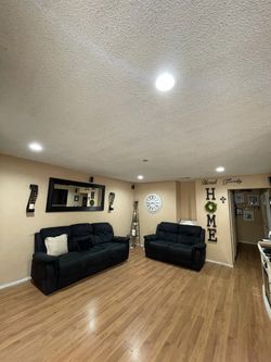 Black Reclining Sofa and Loveseat Set