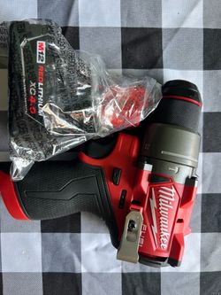 Milwaukee M12 Fuel Brushless Hammer Drill Driver and 4.0 Battery
