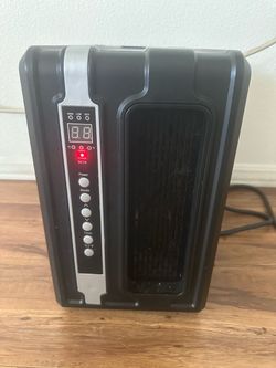 Title: Portable Electric Space Heater with Digital Controls – $15