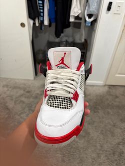 Size 10 fire red Jordan 4 used with box