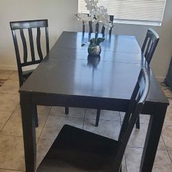 Great Table you can adjust the size you can make it smaller too, and it comes with four seats