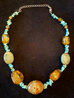 $10. Turquoise rock and glass bead necklace. 20 inches.