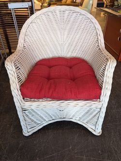 White Woven Wicker Chair with Red Seat Cushion
