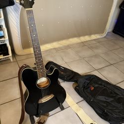 Ibanez guitar with stand and bag