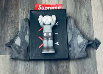 KAWS x Air Jordan 4 Retro Grey Sneakers
