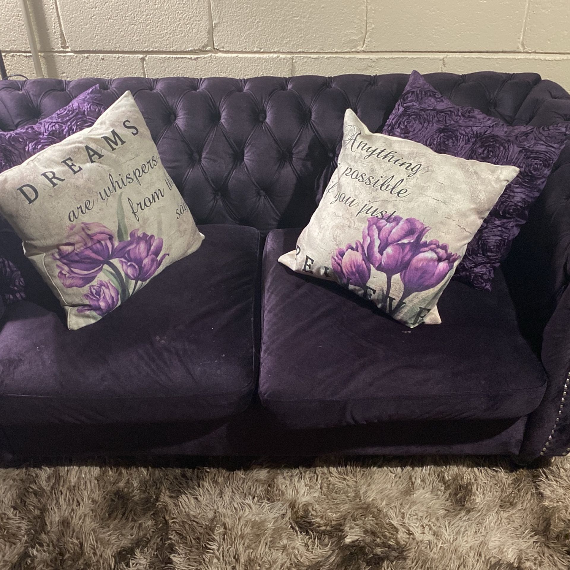 PURPLE COUCH WITH 4 PILLOWS