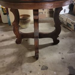 Ornate allwood round antique table $250 OBO