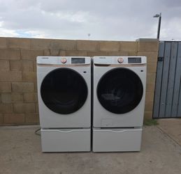 Samsung Front Load Washer and Dryer Set with Pedestals