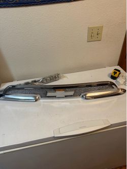 1959 Chevy front clip emblem