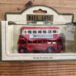  Lledo Days Gone 1932 AEC Regent double-decker bus diecast model. The specific model features "Palmolive" and "General" livery and was made in England