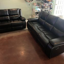 New Reclining Black Couch / Love Seat.  61x38x38H, 86x38x38H.  Free Delivery!