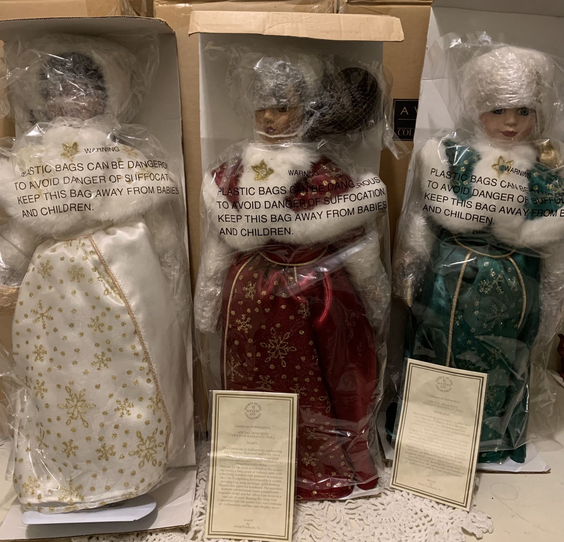 Avon 2001 collectibles-Christmas Holiday radiance porcelain dolls new in box-$25each or 3 for $65