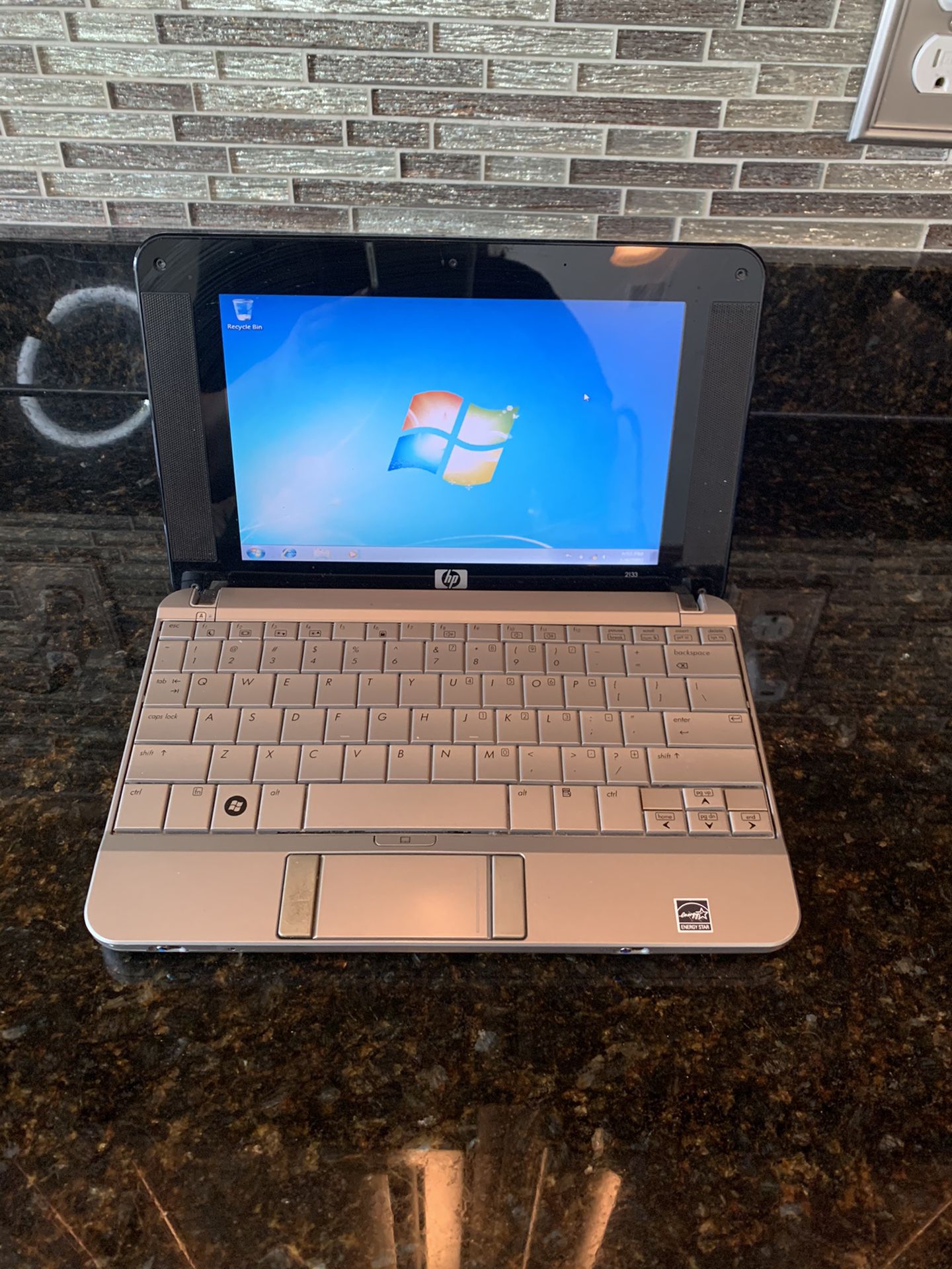 10" HP 2133 Mini Laptop With Webcam, Windows 7 and Microsoft Office.