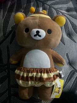 rilakkuma, gloomy, and hello kitty plush