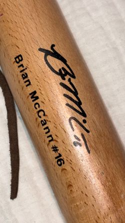 Vintage Atlanta Braves baseball collectors tomahawk signed and bat signed