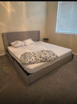 King Bed with mattress in excellent condition .