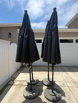4 Black Outdoor Patio Umbrellas $200