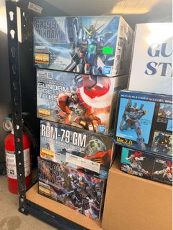 selling new MG Gundams