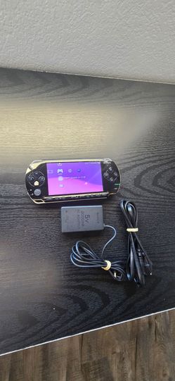 Psp 1000 with a 64gb memory card full of games
