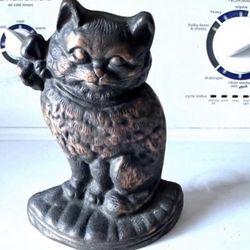 Antique cast iron doorstop