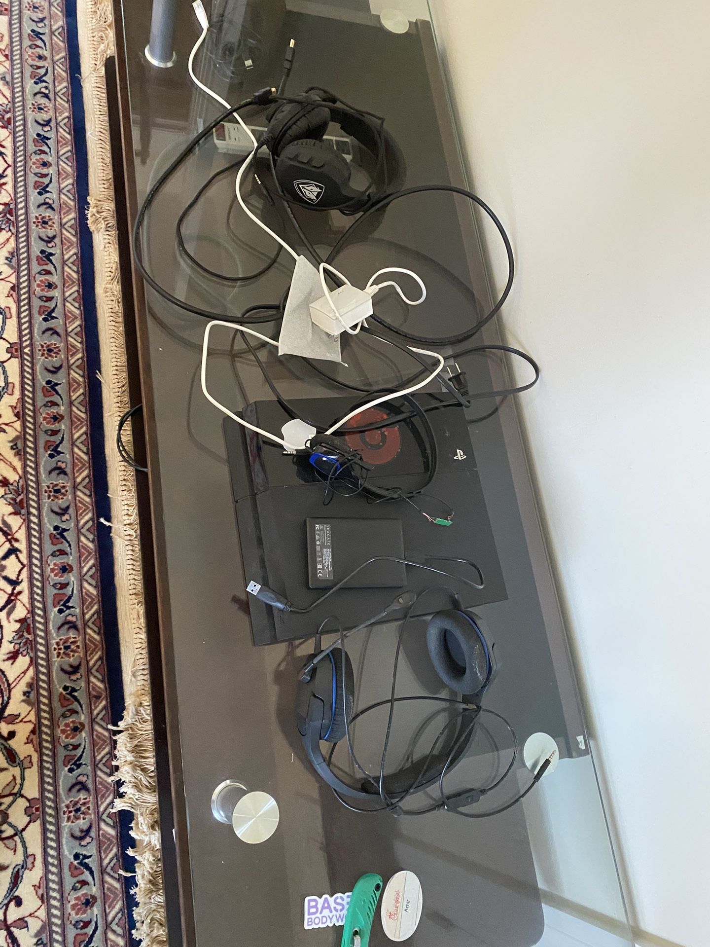 PS4 With Two Headphones And HDMI Line