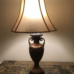 Ceramic 31 inch Lamp can use a 3 way bulb