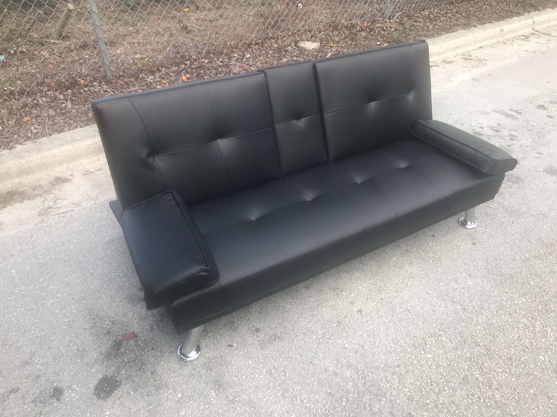 Black leather futon sofa
