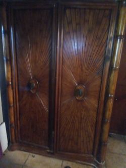 Wood Armoire with Sunburst Door Panels