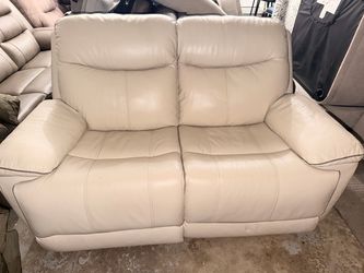 Cream Leather Reclining Loveseat