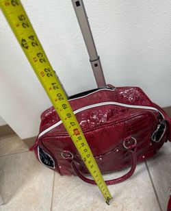 faux-alligator skin Kathy Van Zeeland rolling underseat luggage bag