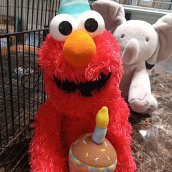 Happy Birthday Singing Elmo. Battery Operated Plush. Candle Does Glow