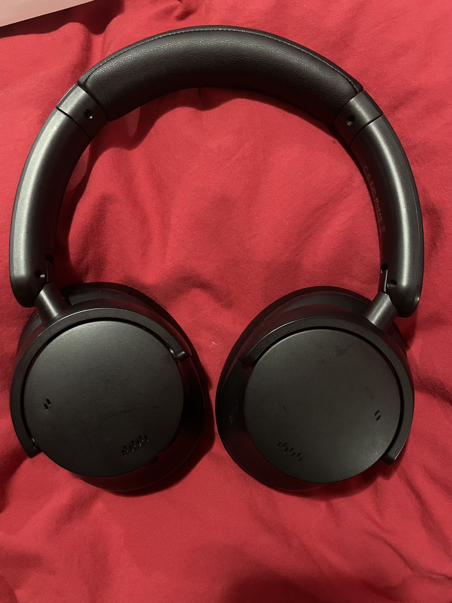 Two pair headphones. One noise canceling 