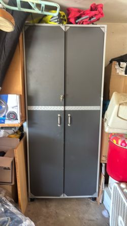 Garage cabinet with lock