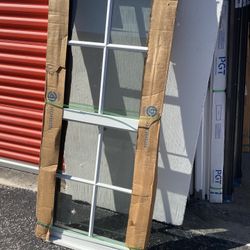 PGT  26x63 IMPACT WINDOW GRIDS ARE REMOVABLE 