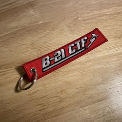 B-21 Raider Stealth Bomber CTF Keychain Remove Before Flight Tag Streamer 