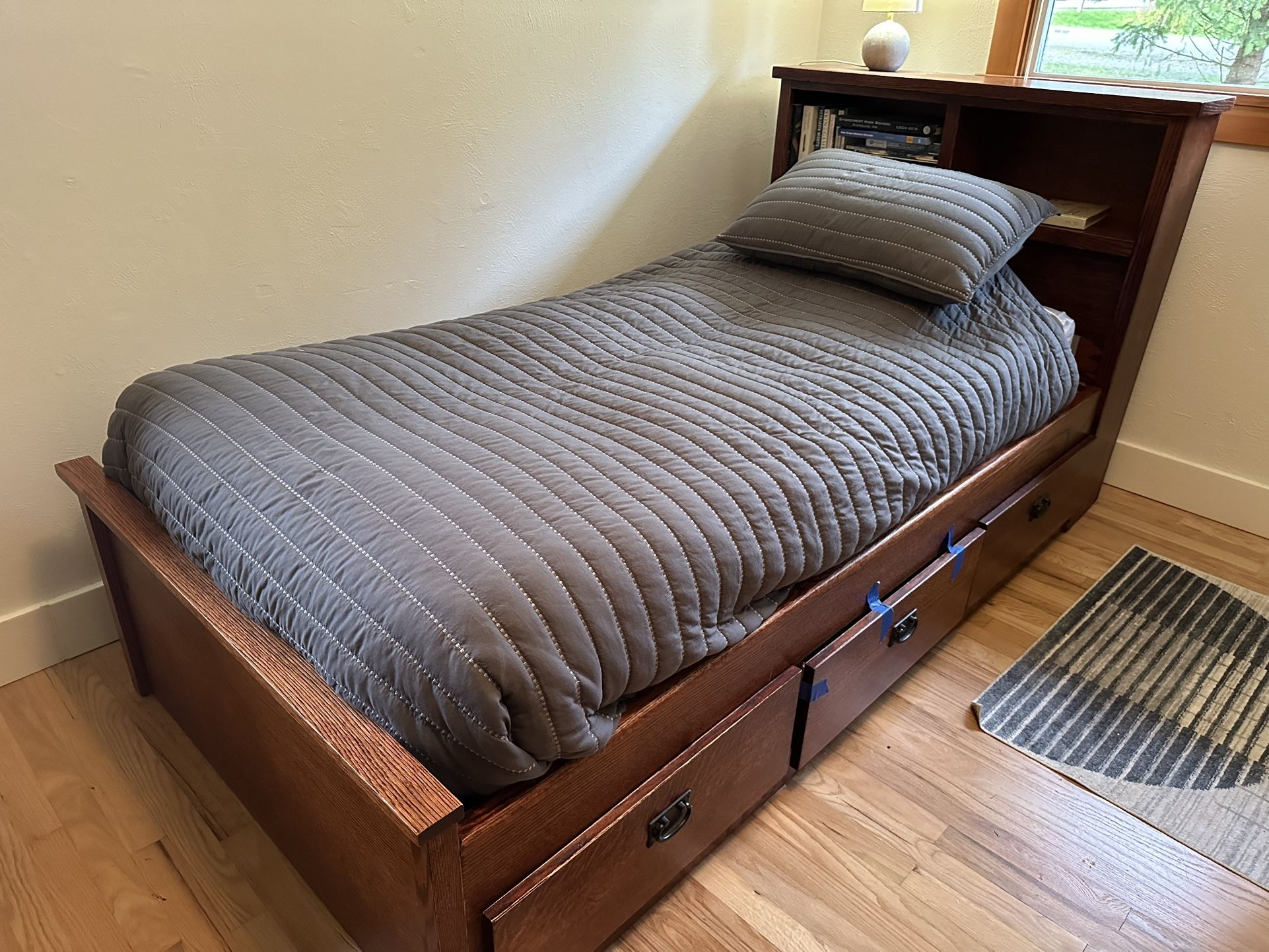 Twin bed with oak wood frame