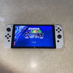 NINTENDO SWITCH OLED with 100 SWITCH GAMES 