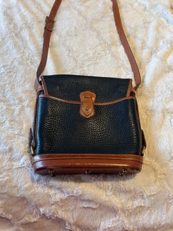4 Dooney & Bourke Handbags- Sold together as a bundle