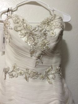Wedding dress NWT originally 2,500 size 10