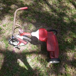 Tricycle  Has a little rust that needs to be cleaned off other than that it's in perfect working condition it was my grandsons and hes 15 now