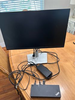Dell computer screen and a Thinkpad docking station