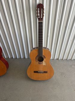 Used acoustic guitar