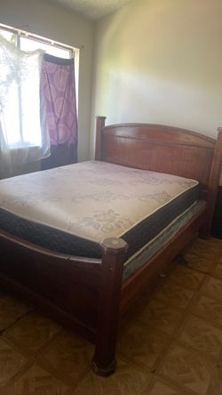 large queen bed with mattress